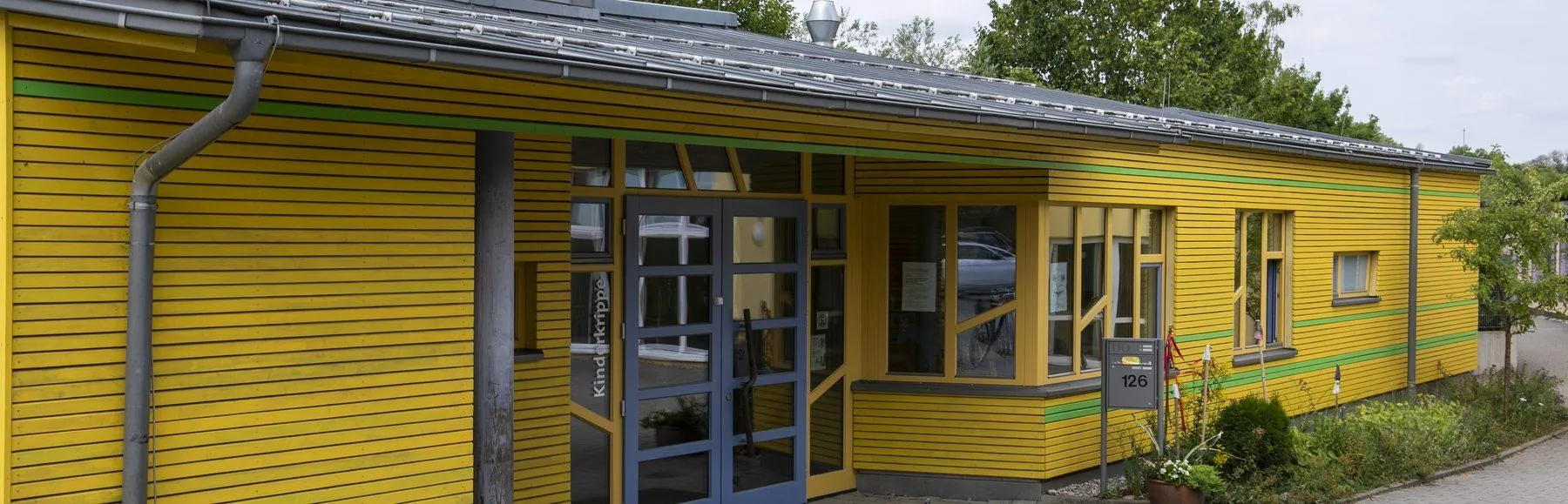 Das gelbe Gebäude der Kinderkrippe in der Scheffoldstraße